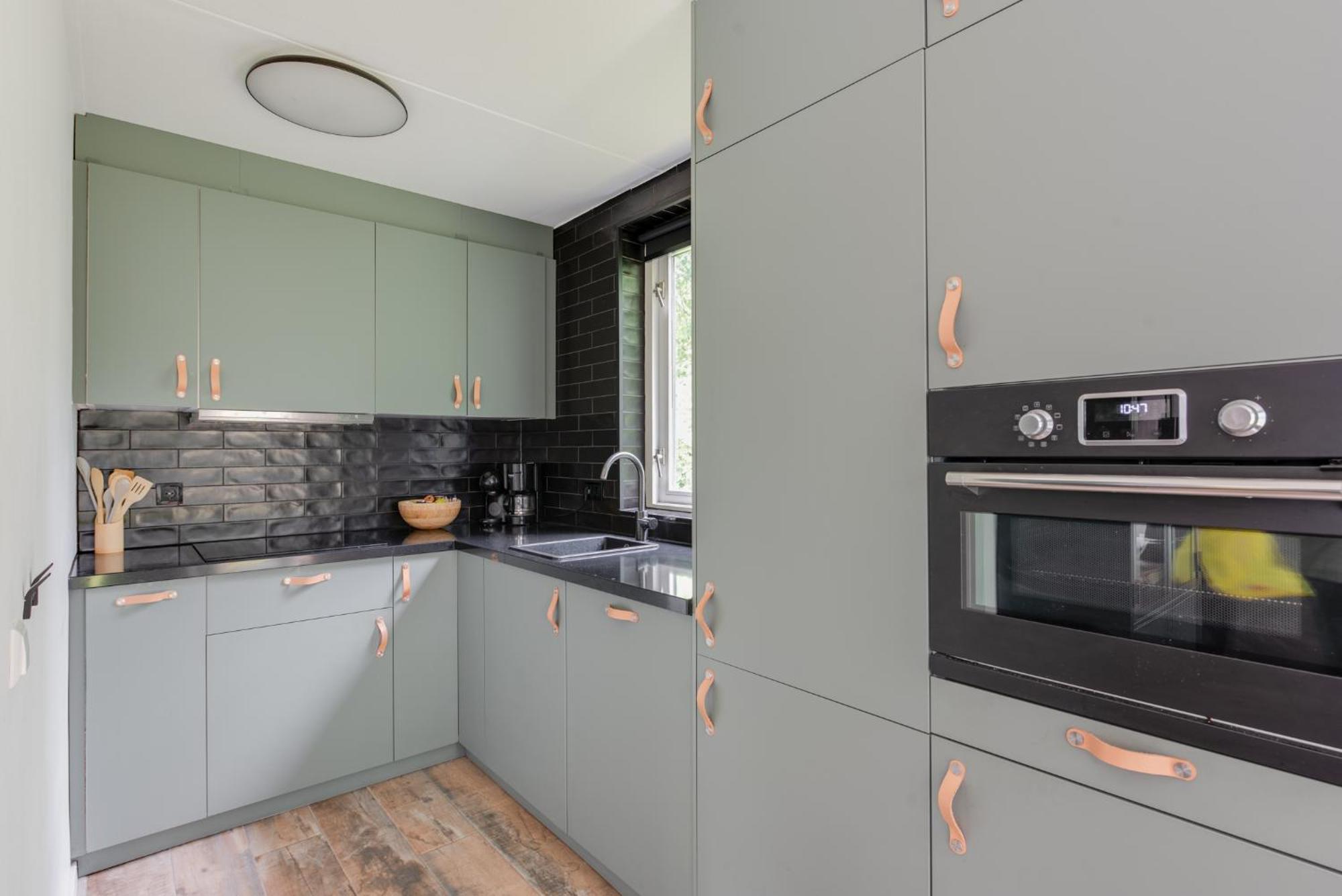 Het Huys Ewijk Mooi Luxe En Een Laadpaal Kültér fotó